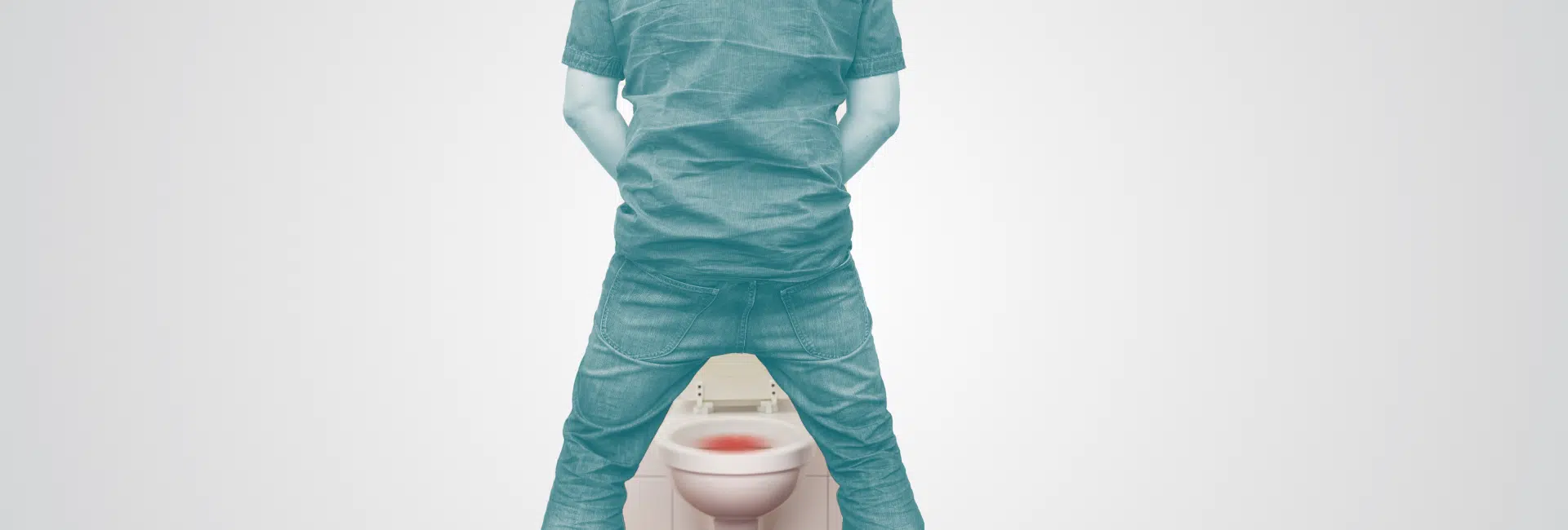 Man urinating blood into toilet – Urologic Health Dubai